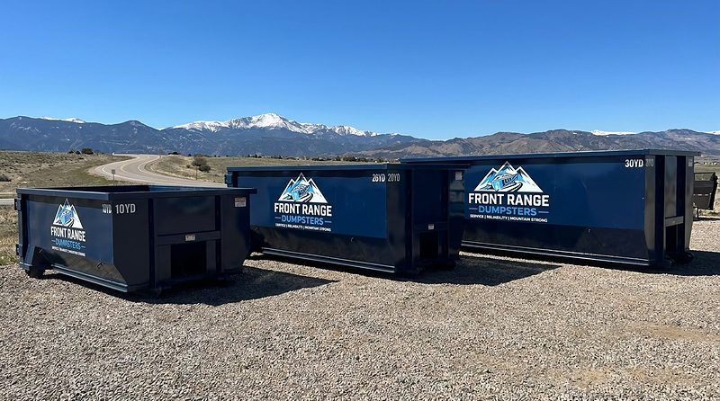 Front Range Dumpsters 10, 20 and 30-yard containers with mountains behind