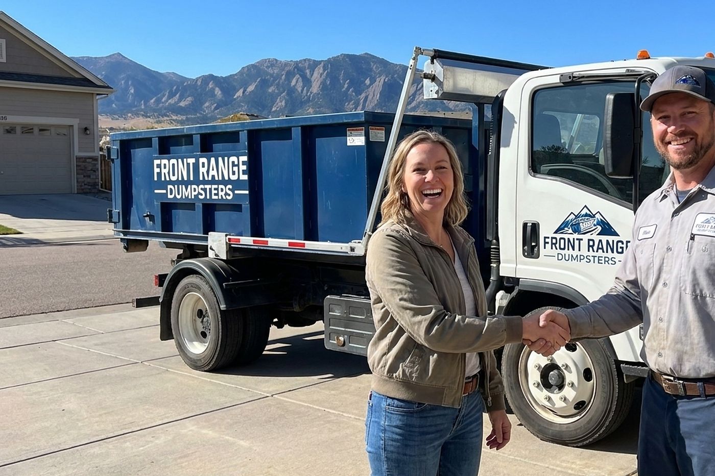 A Front Range Dumpsters roll-off truck at a customer’s house after a same-day delivery