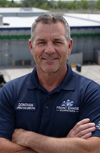 Donovan, Front Range Dumpsters operations director, in the company yard